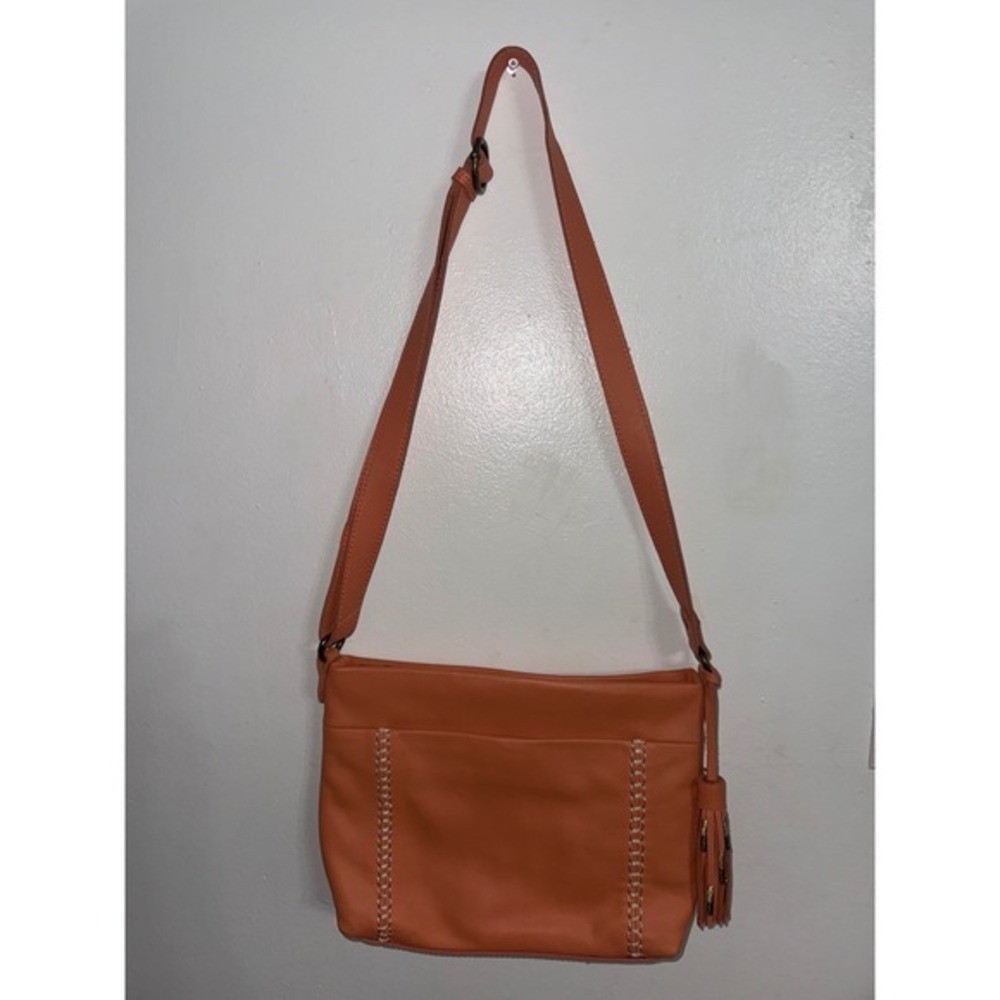 The Sak Orange Leather Crossbody Bag Whipstitch Tassel Detail Adjustable Strap